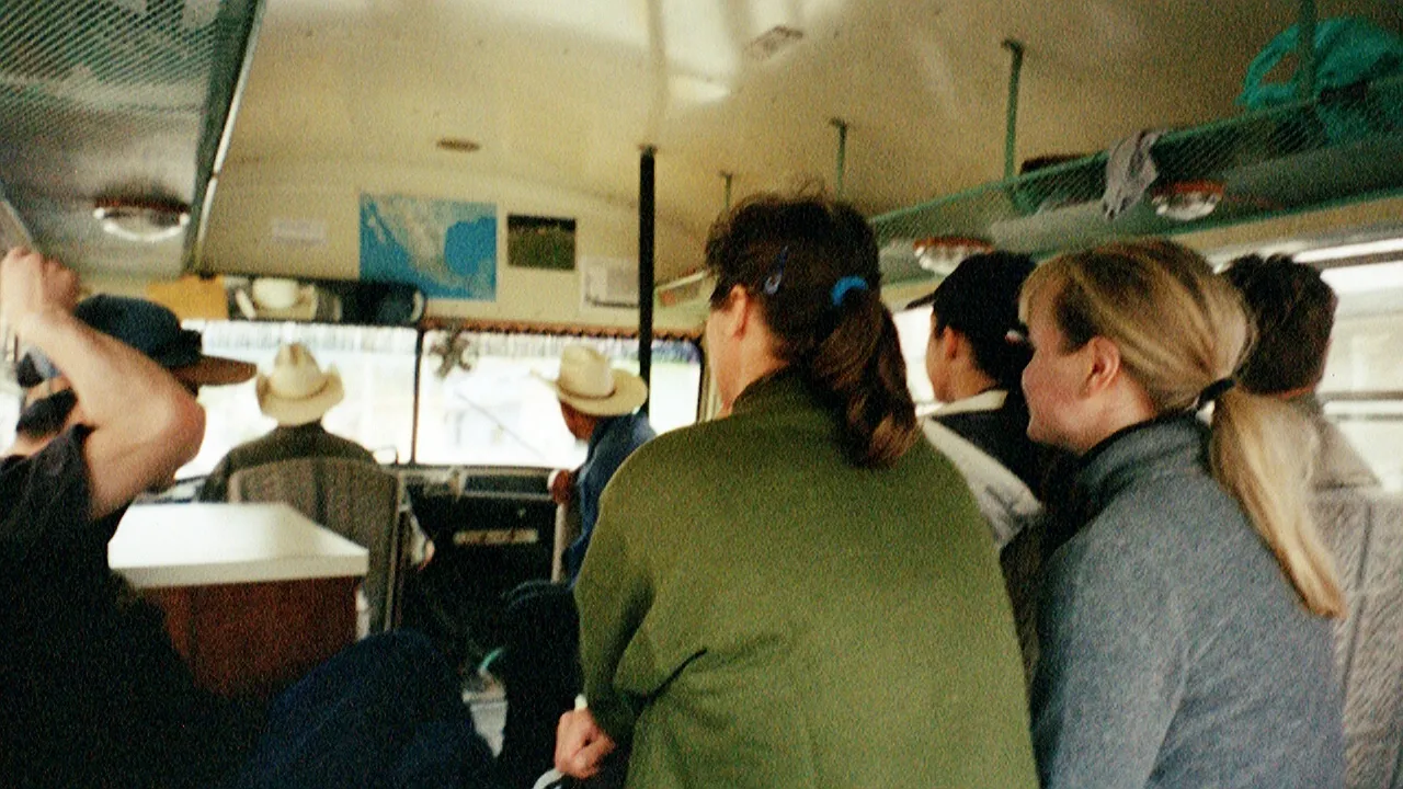 In the yellow bus with our grinning cowboys taking us to our horses
