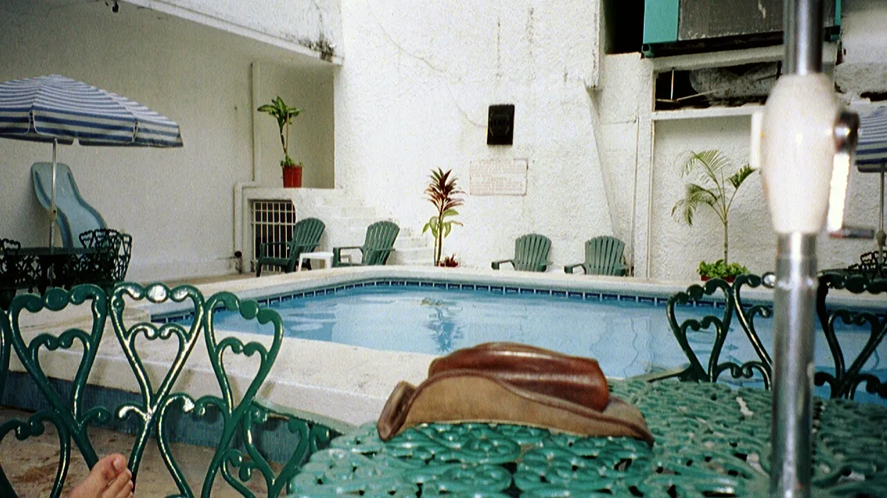 The hotel pool. Notice my hat.