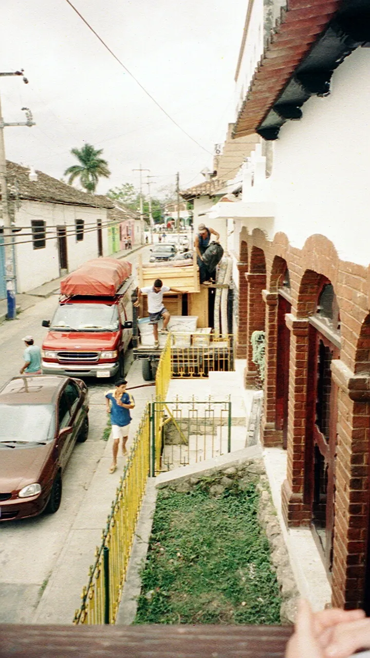The gate to the new Rancho Esmeralda. Notice our bed and mattress getting shoved in!