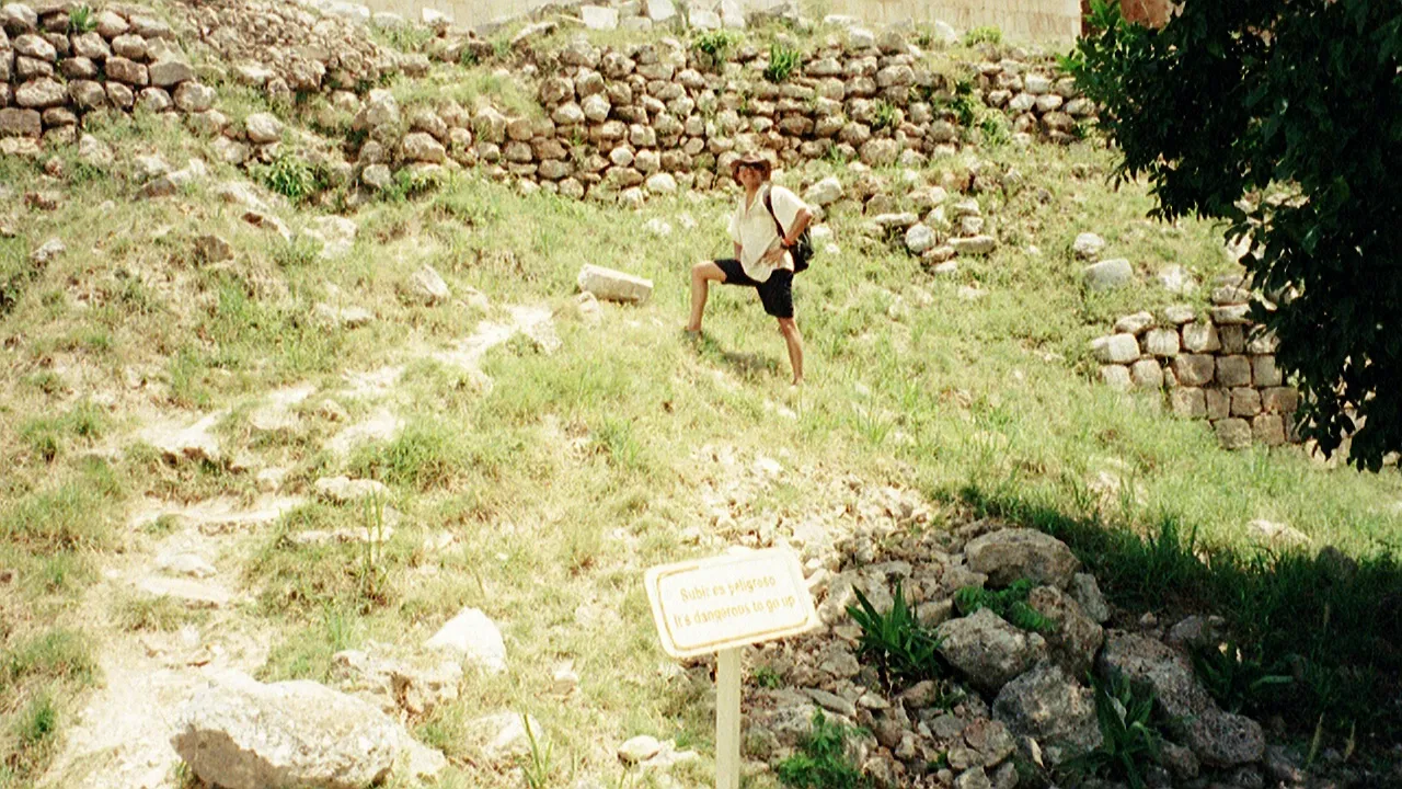 Showing my hardness at Uxmal (the sign says It is dangerous to go up)