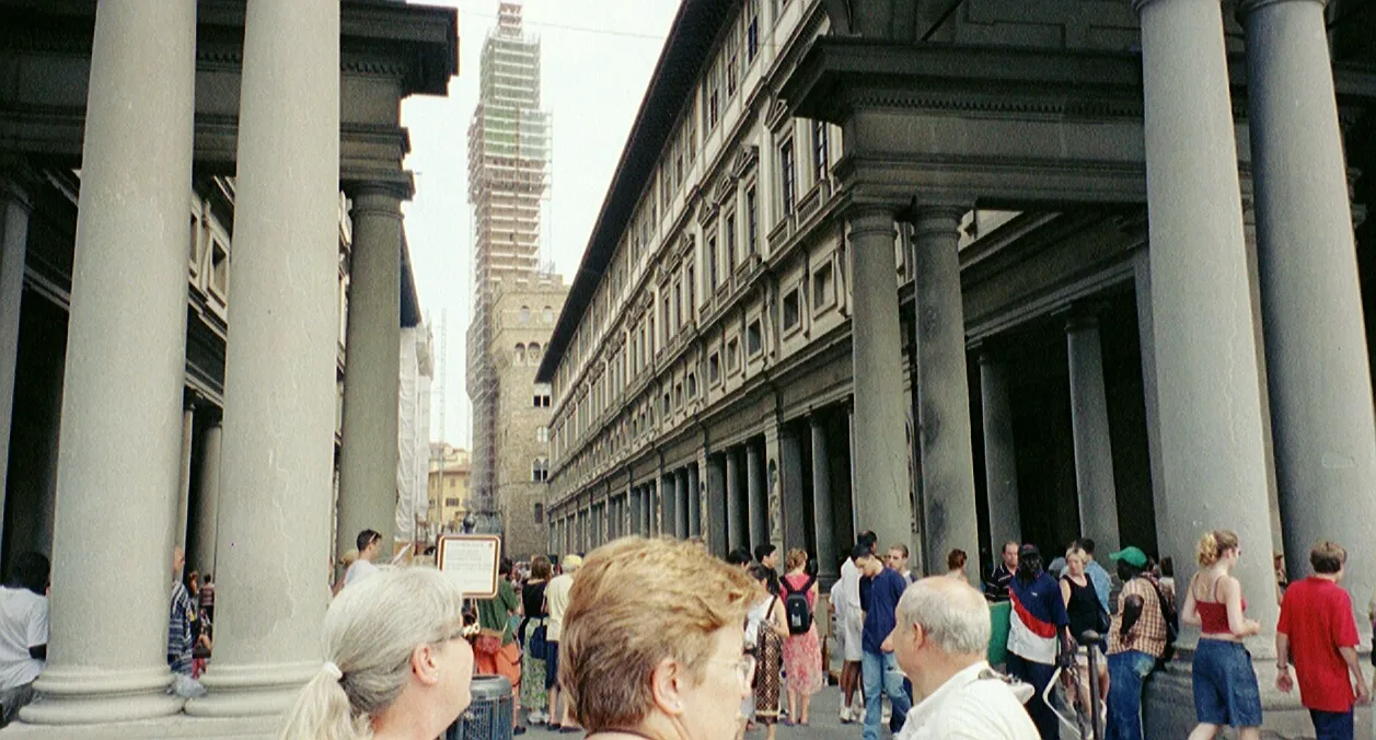 Big grand Florence, full of tourists. Uffizi Gallery opposite
