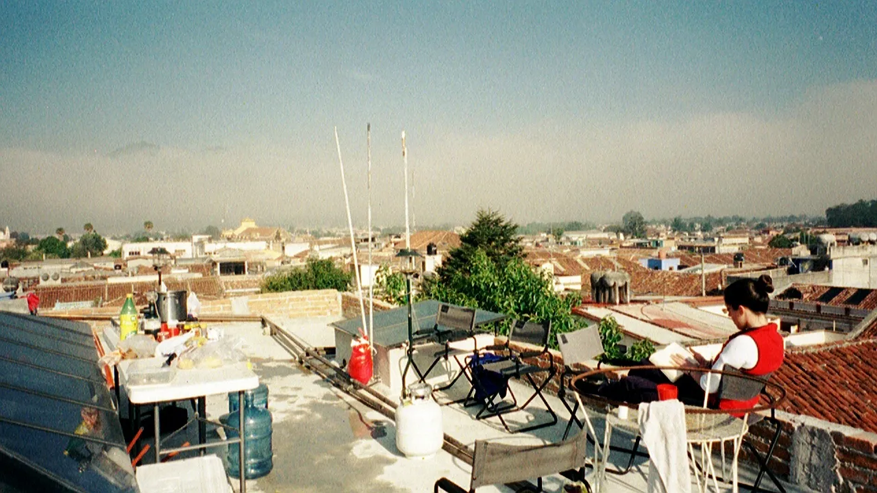 All our stuff on the roof. Bonnie is reading